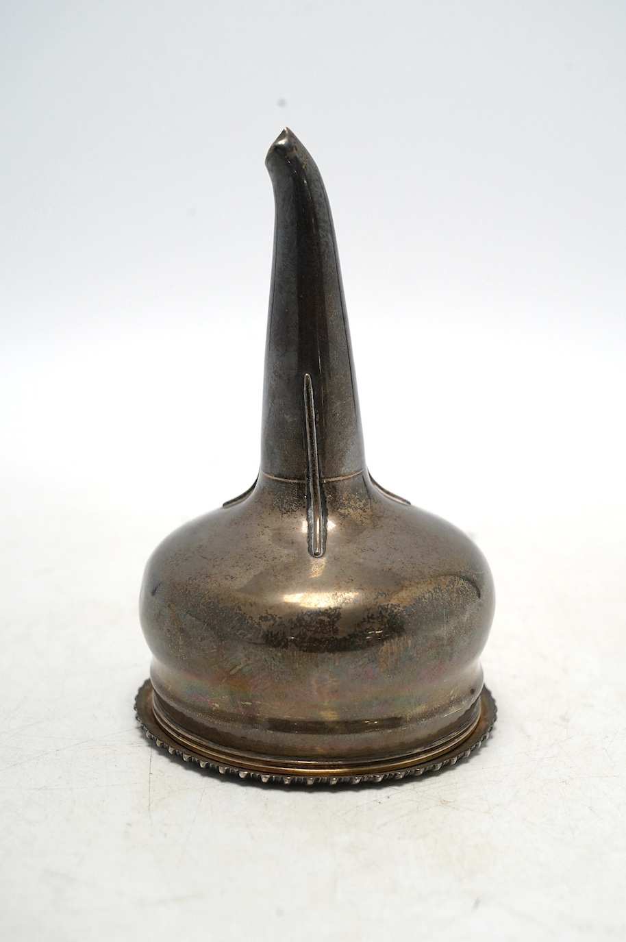 A George IV silver wine funnel, maker's mark rubbed, London, 1823, 13.2cm, 4.7oz. Condition - fair